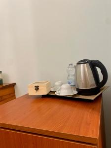 Comodidades para preparar café e chá em Bed & Breakfast Casa Anna Rita