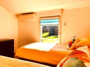 Postel nebo postele na pokoji v ubytování 3-Star Tourism Rated Holiday Home with Air Con and Private Heated Pool - 45 Mins from Sarlat