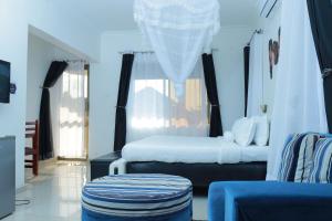 Katil atau katil-katil dalam bilik di Mowicribs Hotel and Spa