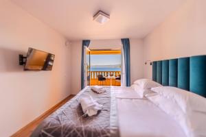 Кровать или кровати в номере Hotel SOL