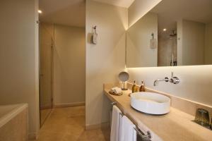 a bathroom with a sink and a shower at Sant Jaume Design Hotel in Palma de Mallorca