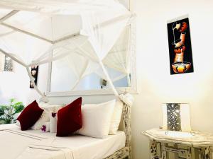 Postel nebo postele na pokoji v ubytování Dream Luxury B&b Watamu