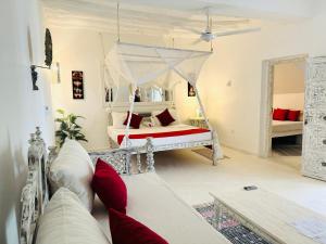 Postel nebo postele na pokoji v ubytování Dream Luxury B&b Watamu