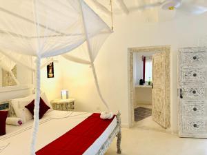 Postel nebo postele na pokoji v ubytování Dream Luxury B&b Watamu