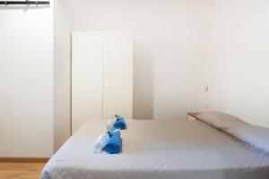 A bed or beds in a room at LA FENICE A.C.