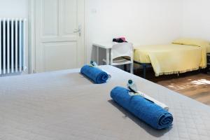 A bed or beds in a room at LA FENICE A.C.