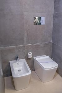 Koupelna v ubytování Isgrò Rooms
