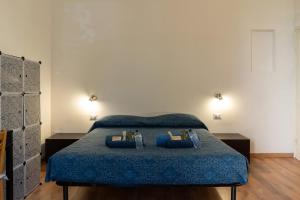 A bed or beds in a room at LA FENICE A.C.