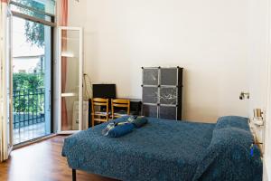 A bed or beds in a room at LA FENICE A.C.