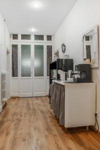 A kitchen or kitchenette at LA FENICE A.C. Még 37 kép