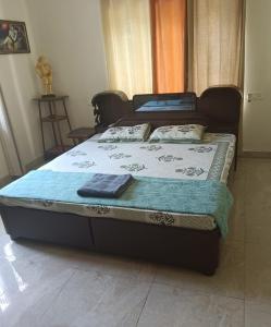 Postel nebo postele na pokoji v ubytování The Olive Greens + 10 fotografií