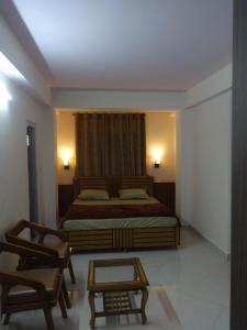 Un pat sau paturi într-o cameră la Gursimrat Homestay