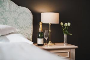 Postel nebo postele na pokoji v ubytování Hotel Adria