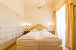 Postel nebo postele na pokoji v ubytování Hotel Adria