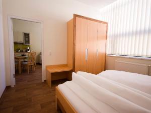 Postel nebo postele na pokoji v ubytování Apartments Obernosterer