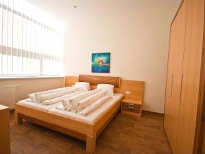 Postel nebo postele na pokoji v ubytování Apartments Obernosterer