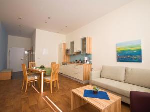 Kuchyň nebo kuchyňský kout v ubytování Apartments Obernosterer