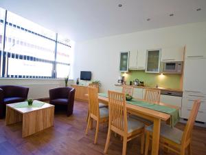 Kuchyň nebo kuchyňský kout v ubytování Apartments Obernosterer