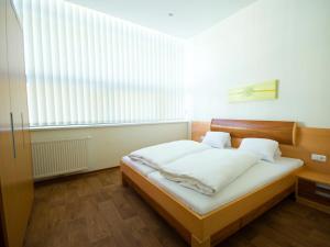 Postel nebo postele na pokoji v ubytování Apartments Obernosterer