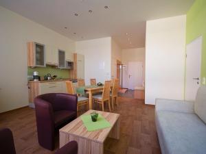 Kuchyň nebo kuchyňský kout v ubytování Apartments Obernosterer