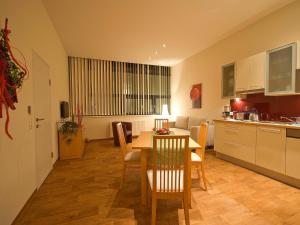 Kuchyň nebo kuchyňský kout v ubytování Apartments Obernosterer