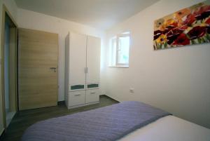 Postel nebo postele na pokoji v ubytování Valentina