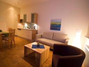 Kuchyň nebo kuchyňský kout v ubytování Apartments Obernosterer