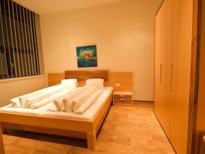 Postel nebo postele na pokoji v ubytování Apartments Obernosterer
