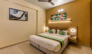 Ένα ή περισσότερα κρεβάτια σε δωμάτιο στο Treebo Nestlay Rooms, Nungambakkam