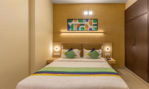 Ένα ή περισσότερα κρεβάτια σε δωμάτιο στο Treebo Nestlay Rooms, Nungambakkam