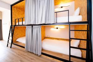 Voodi või voodid majutusasutuse Chao Hostel toas