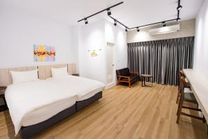 Voodi või voodid majutusasutuse Chao Hostel toas