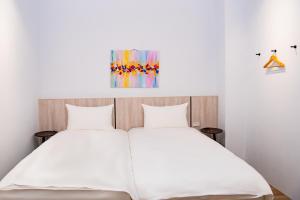 Voodi või voodid majutusasutuse Chao Hostel toas