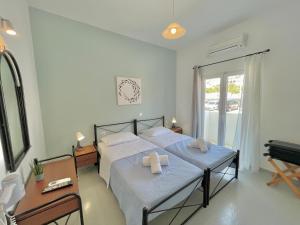 Postel nebo postele na pokoji v ubytování SunDreams rooms