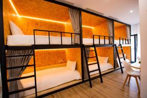 Voodi või voodid majutusasutuse Chao Hostel toas