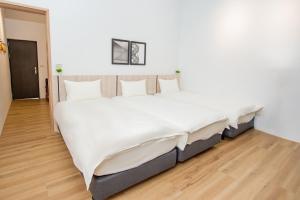 Voodi või voodid majutusasutuse Chao Hostel toas