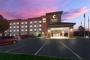 a rendering of a hotel with a car parking lot at Comfort Suites Columbus East Broad in Columbus