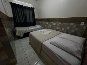 Postel nebo postele na pokoji v ubytování Hotel Meyer