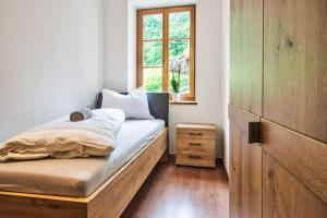 Voodi või voodid majutusasutuse Linslhof Apt Quarz toas