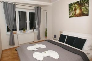 Postel nebo postele na pokoji v ubytování Apartman Tatry