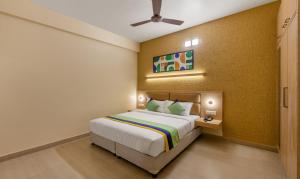 Ένα ή περισσότερα κρεβάτια σε δωμάτιο στο Treebo Nestlay Rooms, Nungambakkam