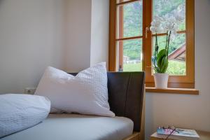 Postel nebo postele na pokoji v ubytování Linslhof Apt Quarz