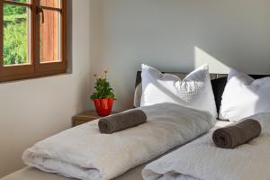 Voodi või voodid majutusasutuse Linslhof Apt Quarz toas