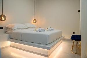 Llit o llits en una habitació de Omnia Suite