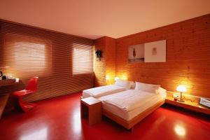 Ein Bett oder Betten in einem Zimmer der Unterkunft 18Arts Hotel - Living in a Gallery!