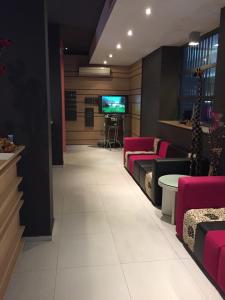 A television and/or entertainment centre at Hotel Dunav