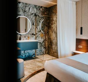Postel nebo postele na pokoji v ubytování Hôtel Fesch & Spa