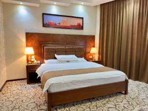 Postel nebo postele na pokoji v ubytování Hotel Sultan