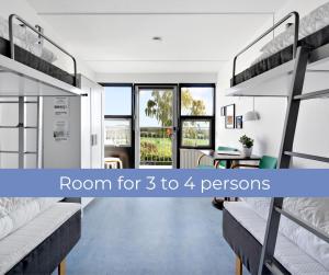 Postel nebo postele na pokoji v ubytování Danhostel Rønde