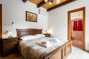 Posteľ alebo postele v izbe v ubytovaní Villa Stauri
